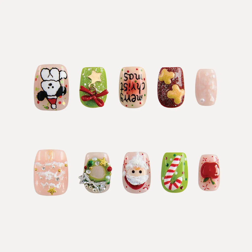 Christmas Sonata 3D square short press-on nails with holiday 3D designs: chef Snoopy, green wreath (bow), reversed "Merry Christmas" text, red gingerbread stars, snowy pink, beaded wreath, Santa, candy cane, red apple. Festive nail art for Christmas.