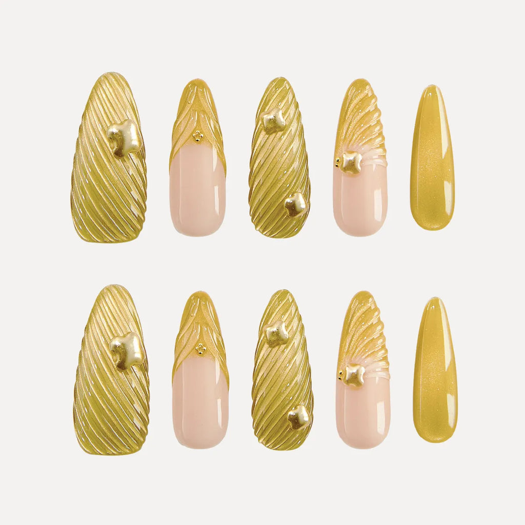 Chapter Gold 3D Press-on Nails (Almond, Long) with gold and pink designs: nails feature 3D gold swirl textures (some with small gold accents) and pink bases with gold 3D details (e.g., shell-like patterns).