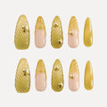 Chapter Gold 3D Press-on Nails (Almond, Long) with gold and pink designs: nails feature 3D gold swirl textures (some with small gold accents) and pink bases with gold 3D details (e.g., shell-like patterns).