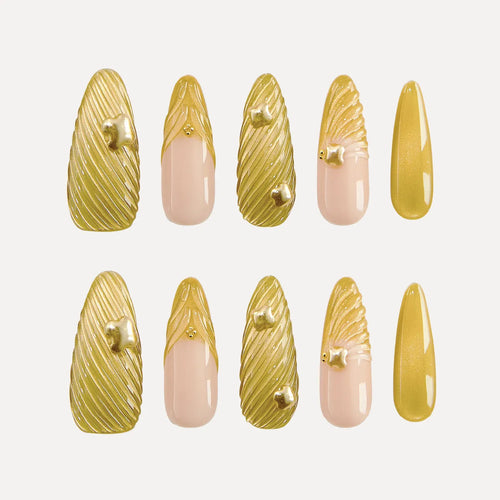 Chapter Gold 3D Press-on Nails (Almond, Long) with gold and pink designs: nails feature 3D gold swirl textures (some with small gold accents) and pink bases with gold 3D details (e.g., shell-like patterns).