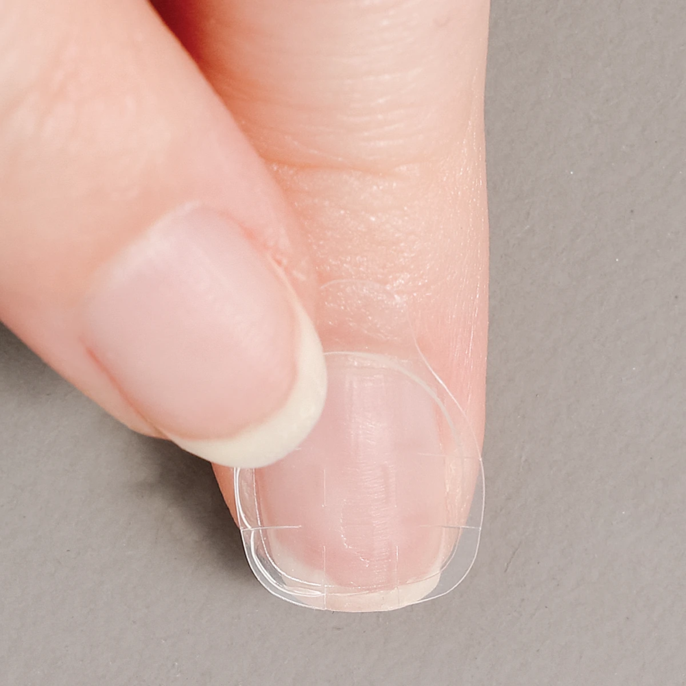 jelly glue tab applied on natural nail