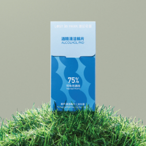 alcohol pad box displayed outdoors on grass