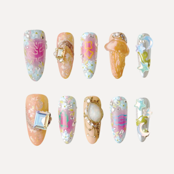 A Splash of Pop press-on nails featuring pastel colors, 3D charms, gemstones, and playful sculptural designs.