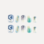 Flat lay of 10 press-on nail pieces with moon, metallic shimmer, and pastel typography