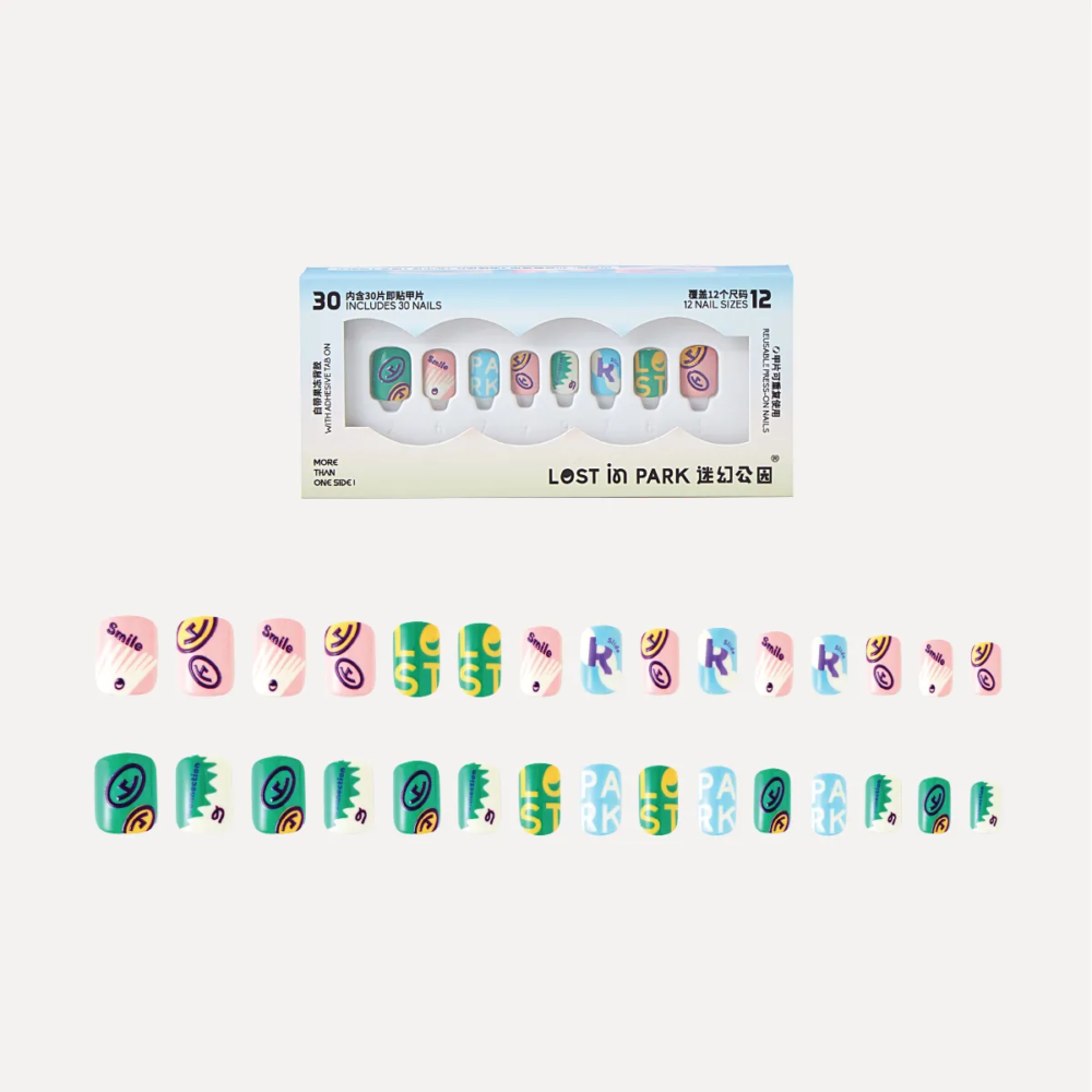 Complete lineup of 30 Riotous Paradise nail pieces in various patterns and colors laid out in rows