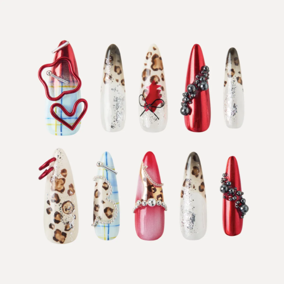 Long stiletto press-on nail size guide with inner arc and length measurements for XS to L sizes