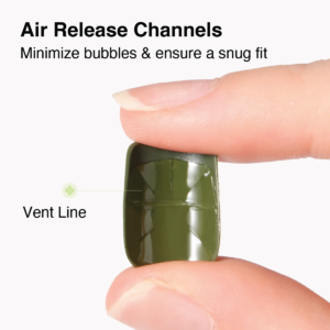 Close-up of a press-on nail showing inner air release channels and vent lines.