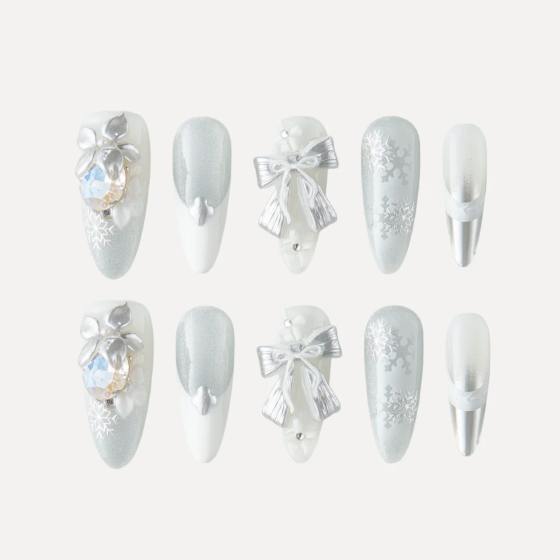 Snowy Nocturne long almond press on nail set with silver white bow and snowflake design