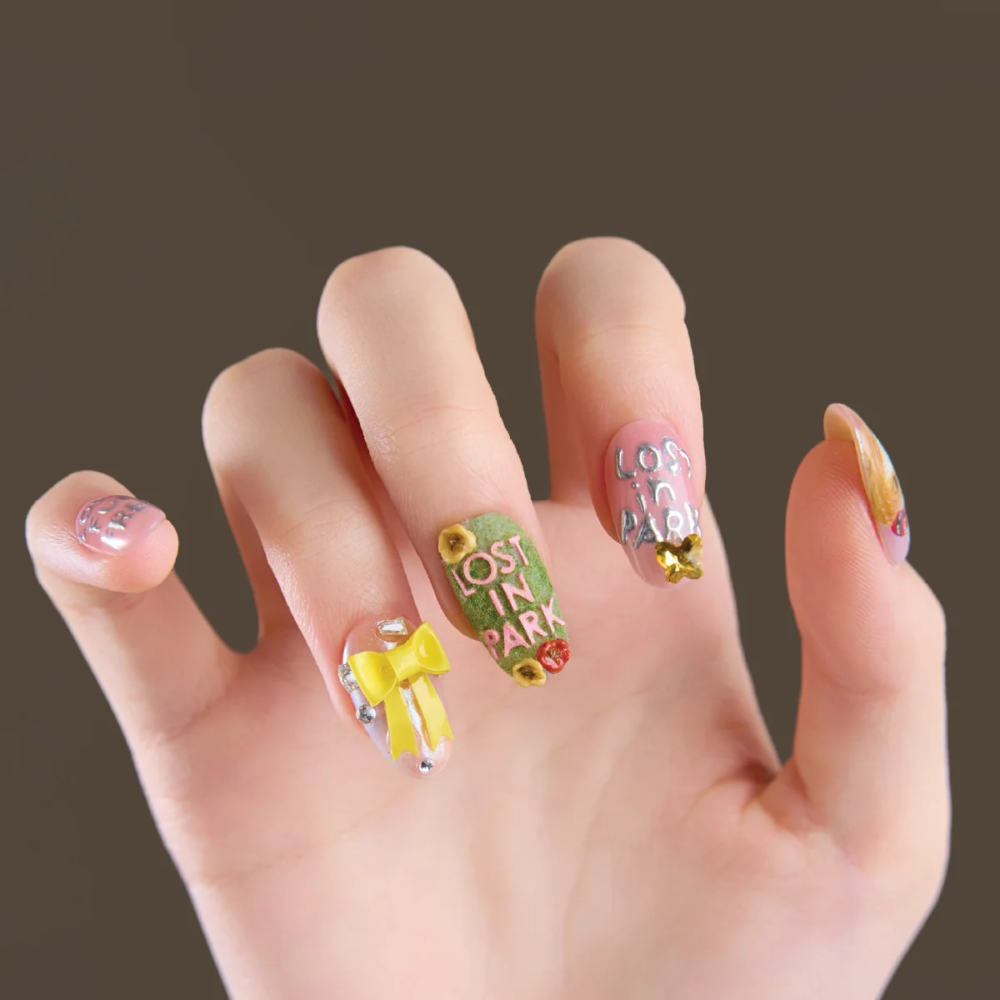 Short oval press on nails size guide showing inner arc and length measurements for XS to