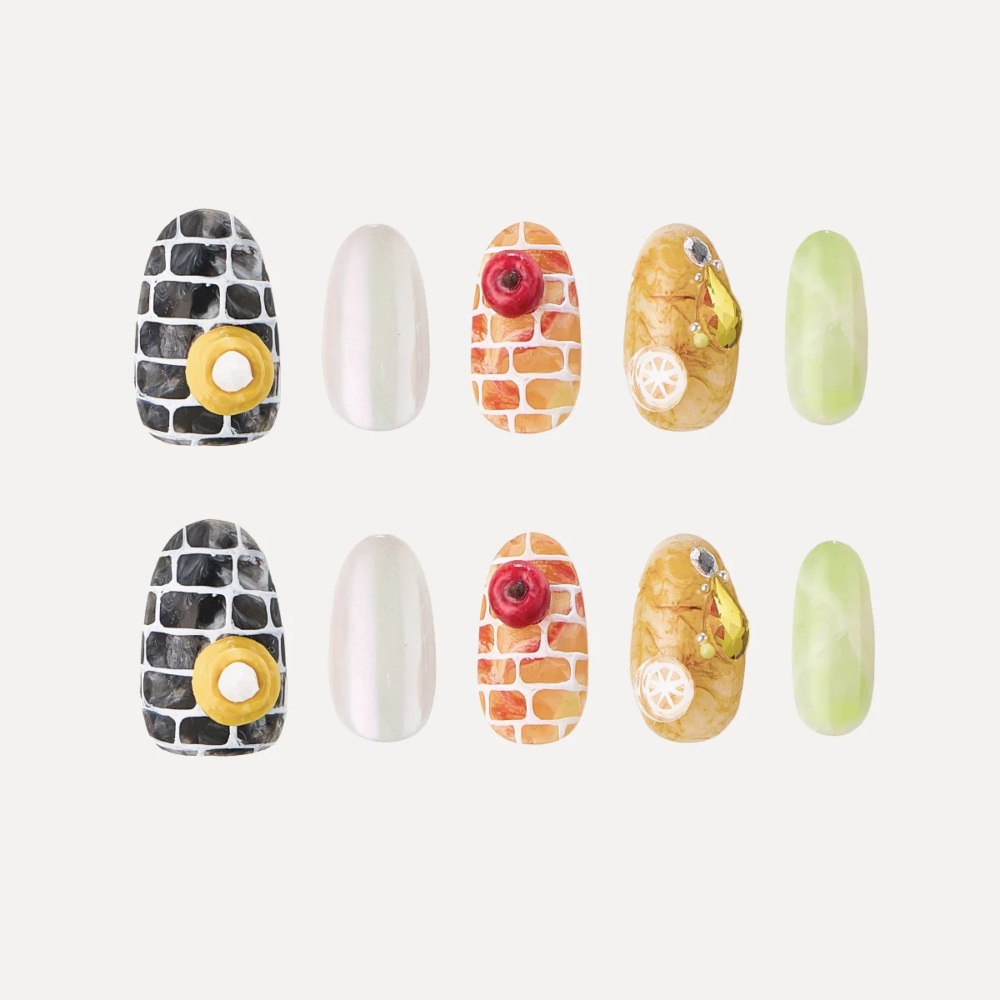 Miss Glimmerhood short oval press-on nails full set flat lay