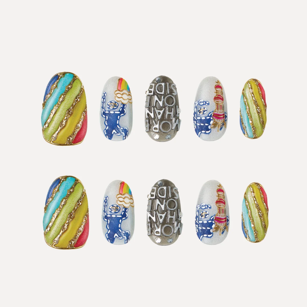 Short oval press-on nail set with rainbow stripes and graphic motifs