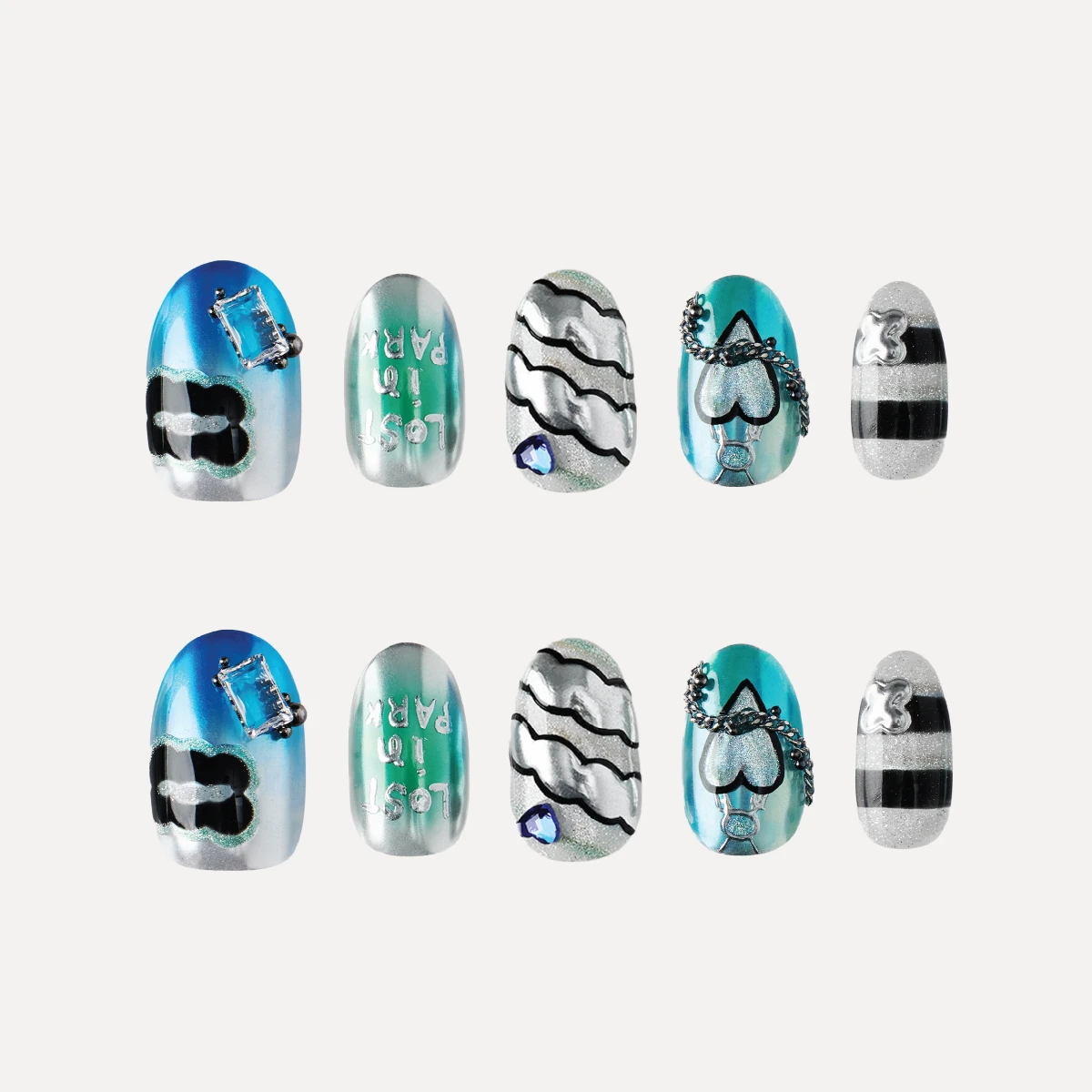 LOST IN PARK Electric Heart short oval press-on nail set flat lay