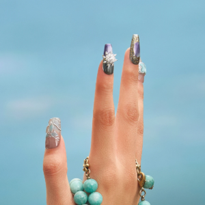 Artistic press-on nails with turquoise and crystal details