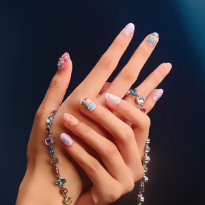 Sweet Charm Box short round press on nails worn on hands with pastel crystal details